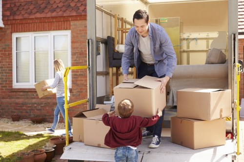 Moving team with protective equipment and insured service focus