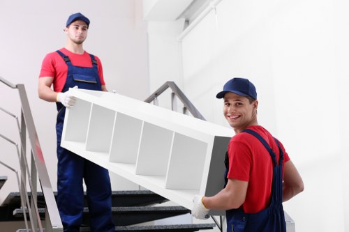 Office removal service in Kingston with desks and equipment being moved