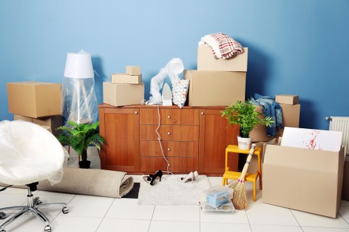 Local packing team helping with fragile household items in Kingston