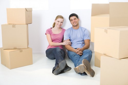 Removal van and moving team preparing a Kingston home move