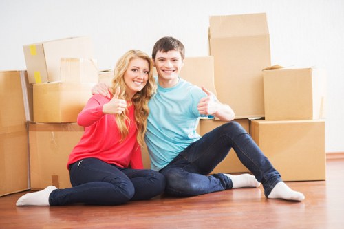 Packed boxes and furniture prepared for a Kingston home removal