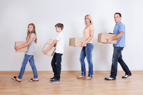 Loading furniture into a removal truck in Kingston